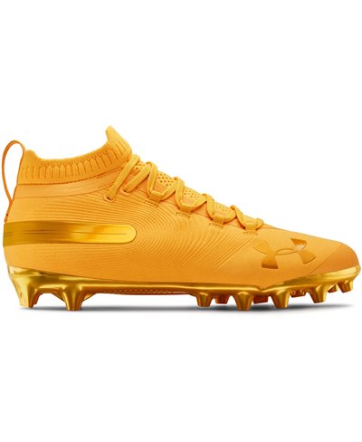 white and gold under armour cleats