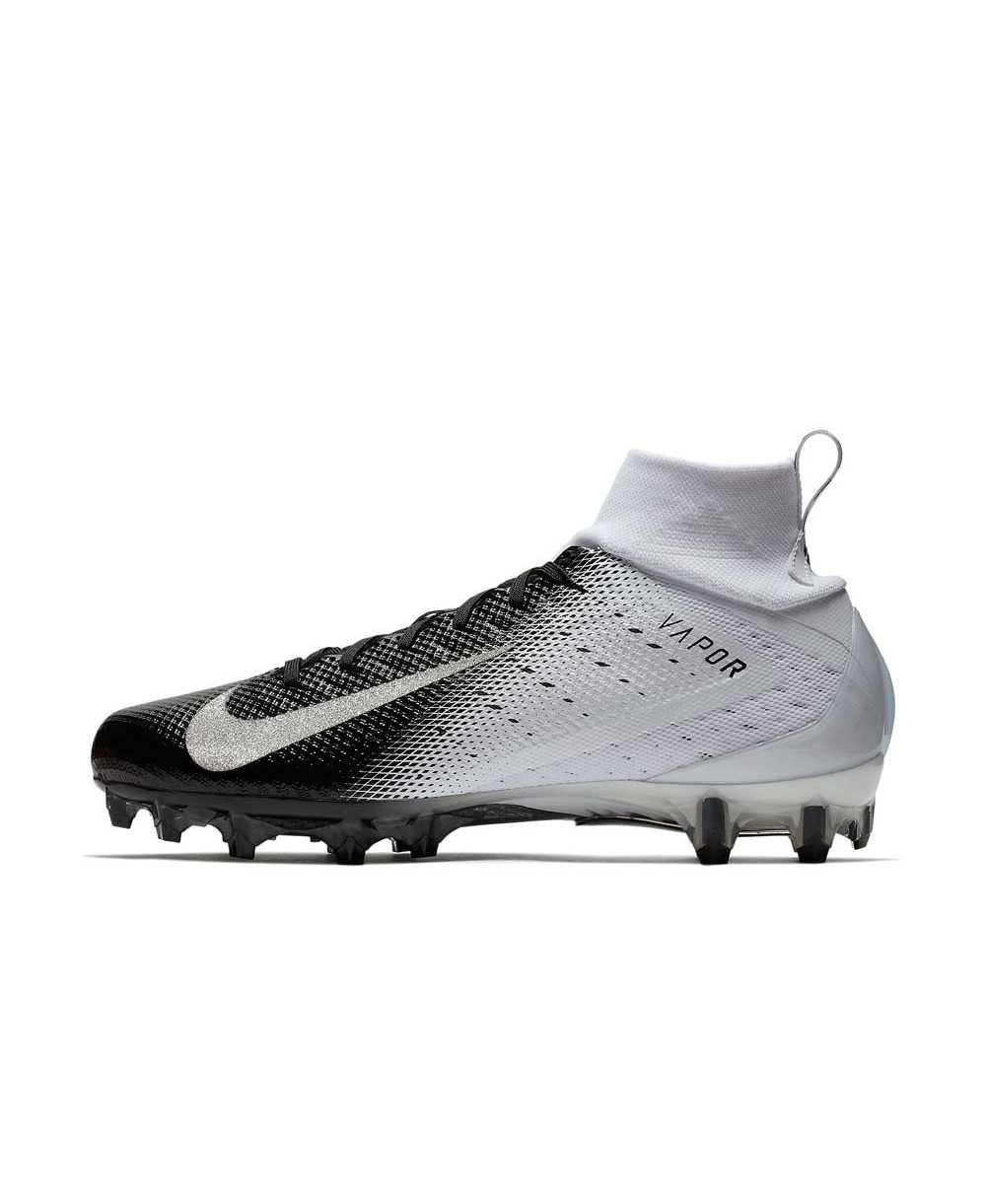 black and white cleats