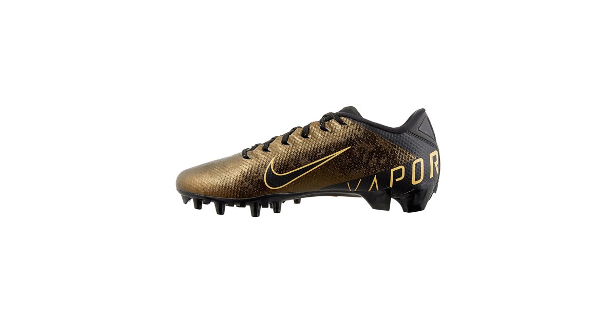 gold nike spikes