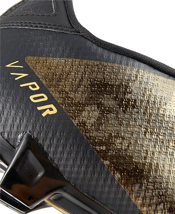 gold and black nike football cleats