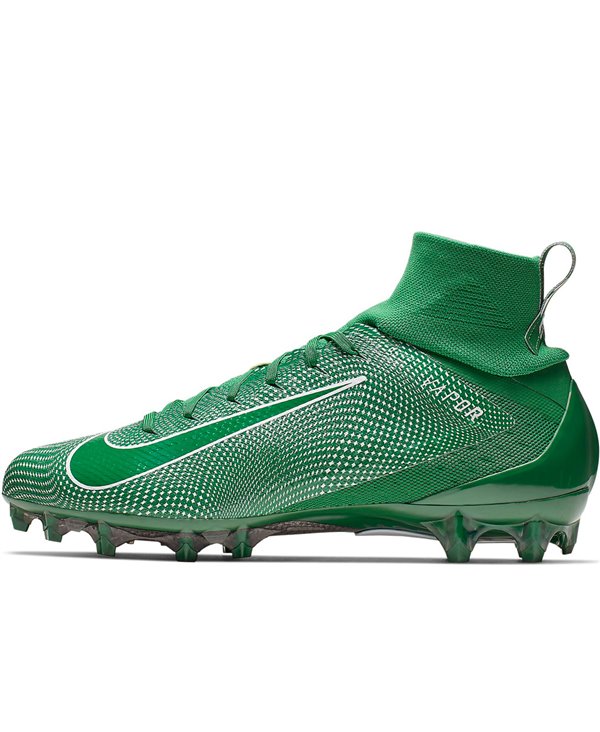 green and white football cleats