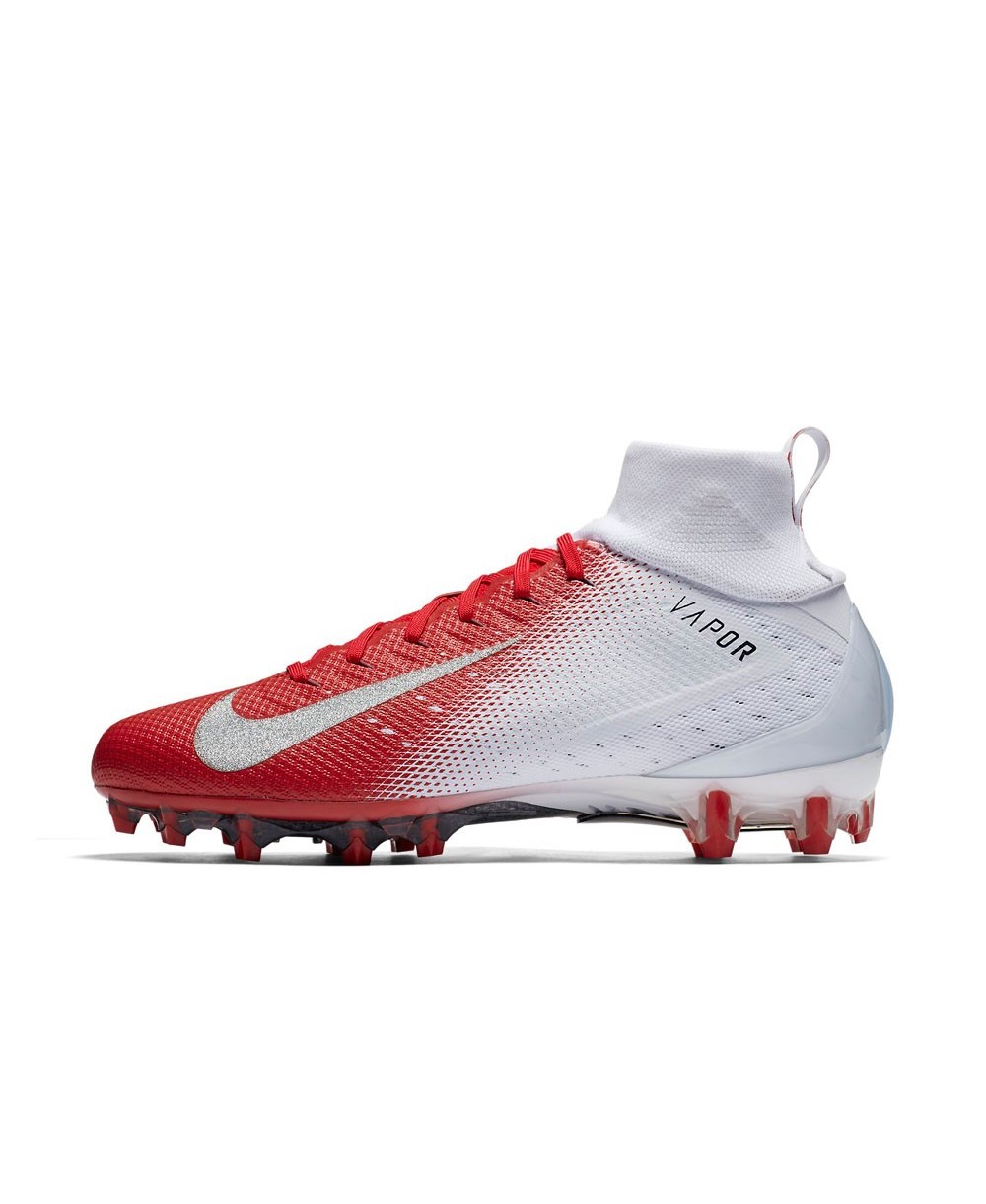 white and red football cleats