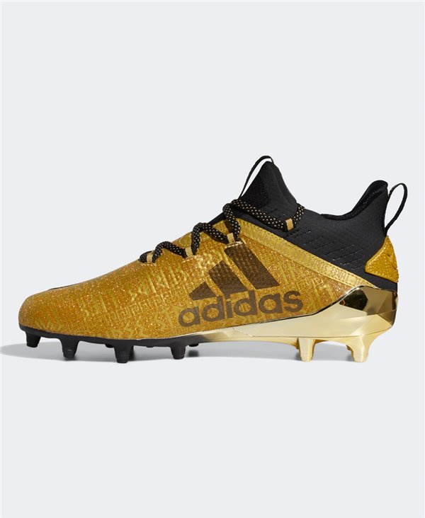 metallic gold football cleats